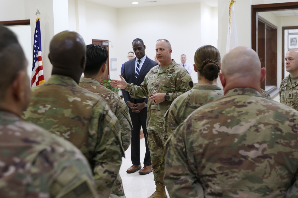 Task Force Liberty Soldiers promote, re-enlist at Qatar embassy ceremony