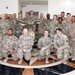 Task Force Liberty Soldiers promote, re-enlist at Qatar embassy ceremony