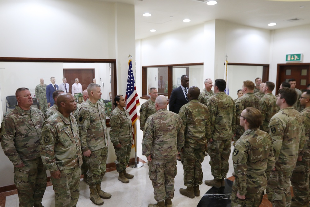 Task Force Liberty Soldiers promote, re-enlist at Qatar embassy ceremony