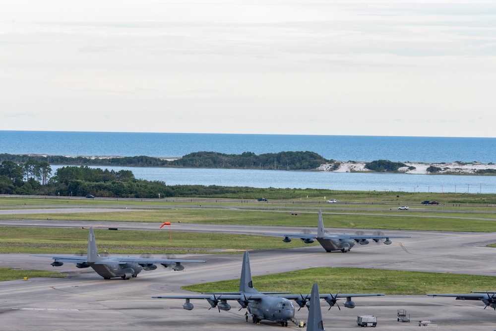 AFSOC MC-130J’s train formation flight