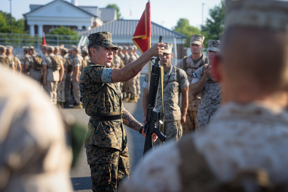 Candidates with Officer Candidate School practice close order drill at the Parade Deck on Marine Corps Base Quantico