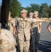 Candidates with Officer Candidate School practice close order drill at the Parade Deck on Marine Corps Base Quantico