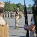 Candidates with Officer Candidate School practice close order drill at the Parade Deck on Marine Corps Base Quantico