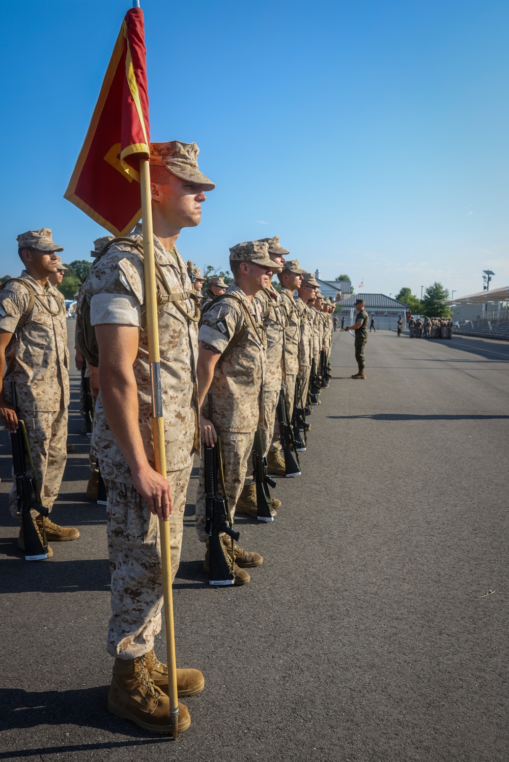 Candidates with Officer Candidate School practice close order drill at the Parade Deck on Marine Corps Base Quantico