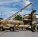 U.S. Army Soliders reassemble CH-47 Chinook helicopter