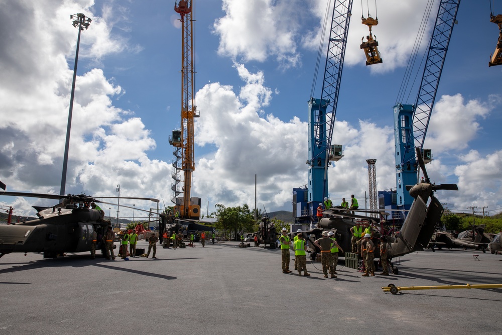 U.S. Army Soldiers collaborate with Royal Thai Army soldiers on mission-essential equipment deload, assembly, and maintenance for Exercise Hanuman Guardian 2023