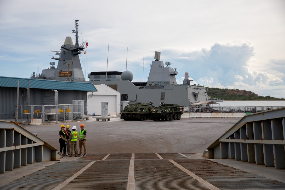 U.S. Army Col. Mary Martinez (left), exercise director for Hanuman Guardian 2023, receives mission reports from operations leadership during a site visit at the Port of Sattahip