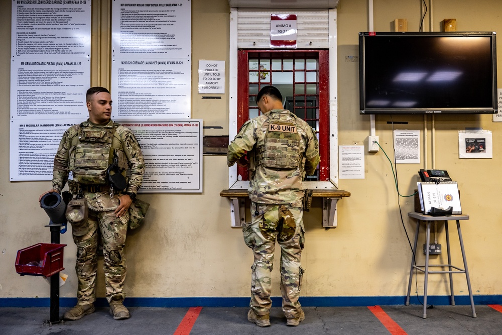 Military Working Dog Team Inspects and Protects