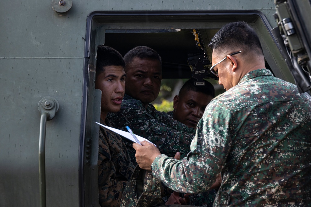 U.S. and Filipino Marines Discuss HIMARS