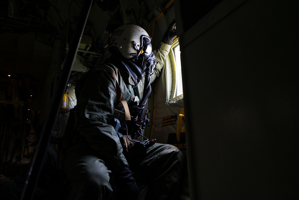 Marine Aerial Refueler Transport Squadron (VMGR) 252 trains with mission-oriented protective posture gear in a KC-130J Super Hercules