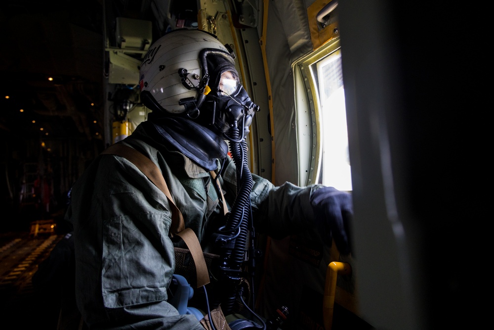 Marine Aerial Refueler Transport Squadron (VMGR) 252 trains with mission-oriented protective posture gear in a KC-130J Super Hercules