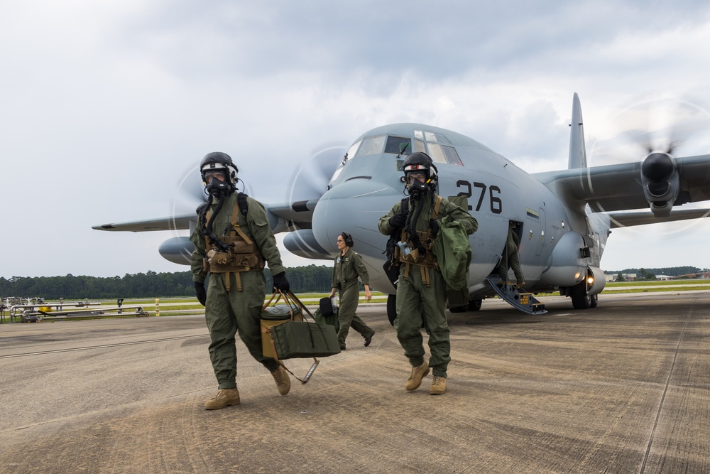 Marine Aerial Refueler Transport Squadron (VMGR) 252 trains with mission-oriented protective posture gear in a KC-130J Super Hercules