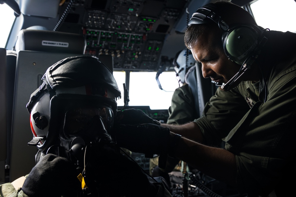 Marine Aerial Refueler Transport Squadron (VMGR) 252 trains with mission-oriented protective posture gear in a KC-130J Super Hercules