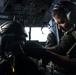 Marine Aerial Refueler Transport Squadron (VMGR) 252 trains with mission-oriented protective posture gear in a KC-130J Super Hercules