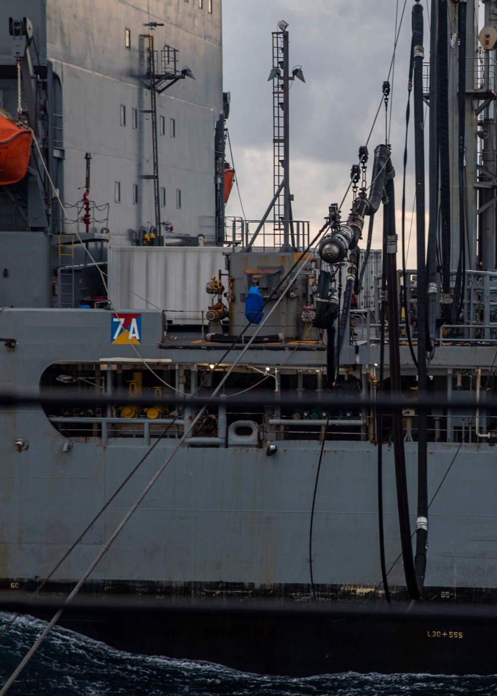 USS Rafael Peralta (DDG 115) conducts a replenishment-at-sea with the Military Sealift Command fleet replenishment oiler USNS Rappahannock (T-AO 204)