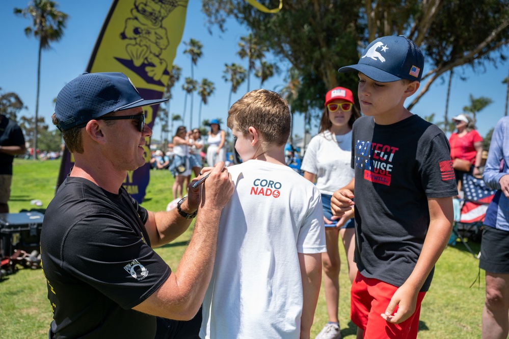 Navy parachute team, the &quot;Leap Frogs,&quot; jump into Coronado Island for 4th of July