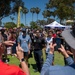 Navy parachute team, the &quot;Leap Frogs,&quot; jump into Coronado Island for 4th of July