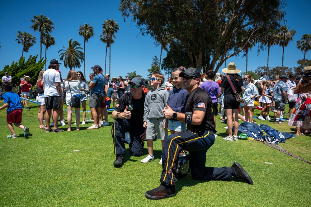 Navy parachute team, the &quot;Leap Frogs,&quot; jump into Coronado Island for 4th of July