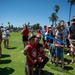 Navy parachute team, the &quot;Leap Frogs,&quot; jump into Coronado Island for 4th of July