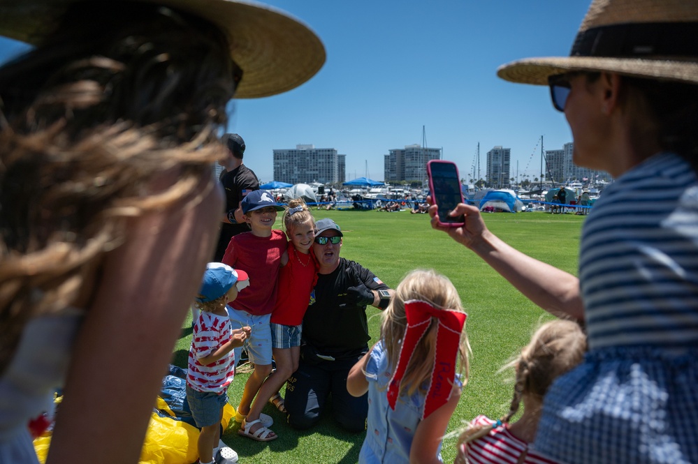 Navy parachute team, the &quot;Leap Frogs,&quot; jump into Coronado Island for 4th of July