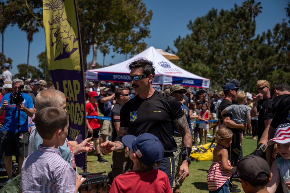 Navy parachute team, the &quot;Leap Frogs,&quot; jump into Coronado Island for 4th of July