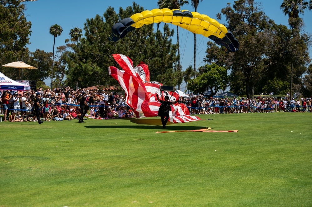 Navy parachute team, the &quot;Leap Frogs,&quot; jump into Coronado Island for 4th of July