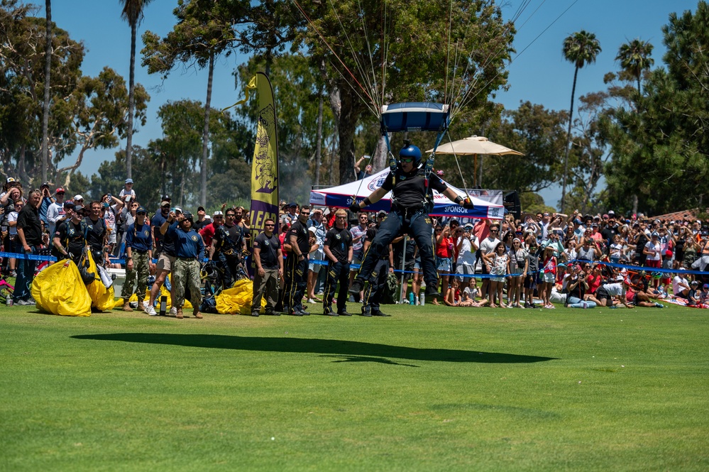 Navy parachute team, the &quot;Leap Frogs,&quot; jump into Coronado Island for 4th of July