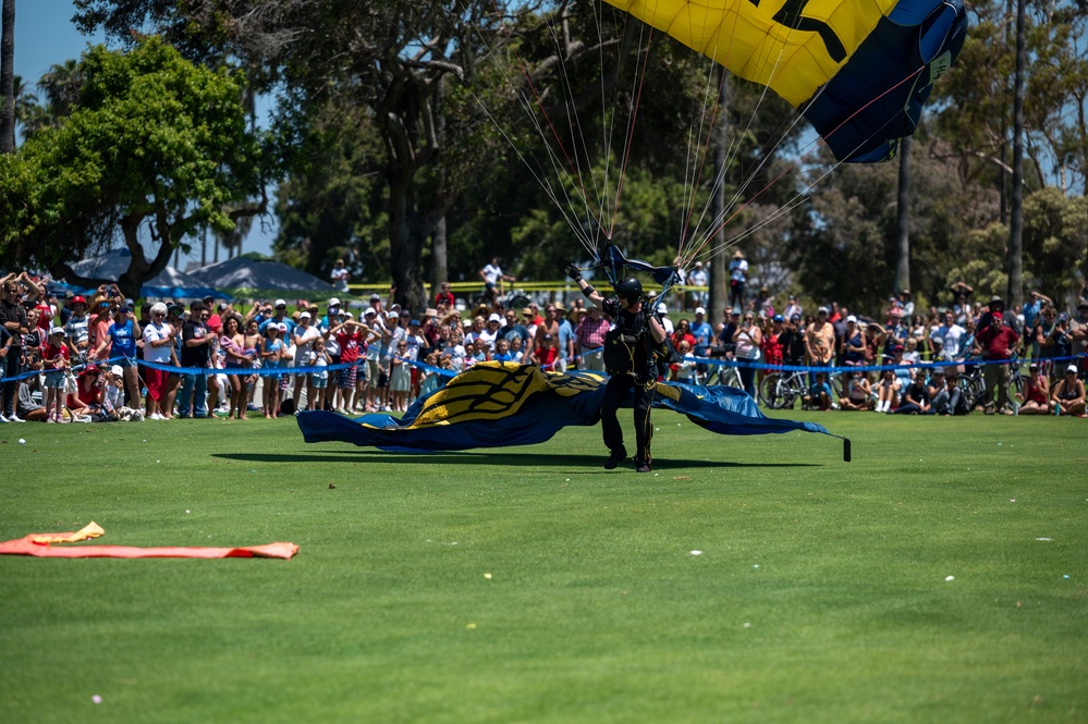 Navy parachute team, the &quot;Leap Frogs,&quot; jump into Coronado Island for 4th of July