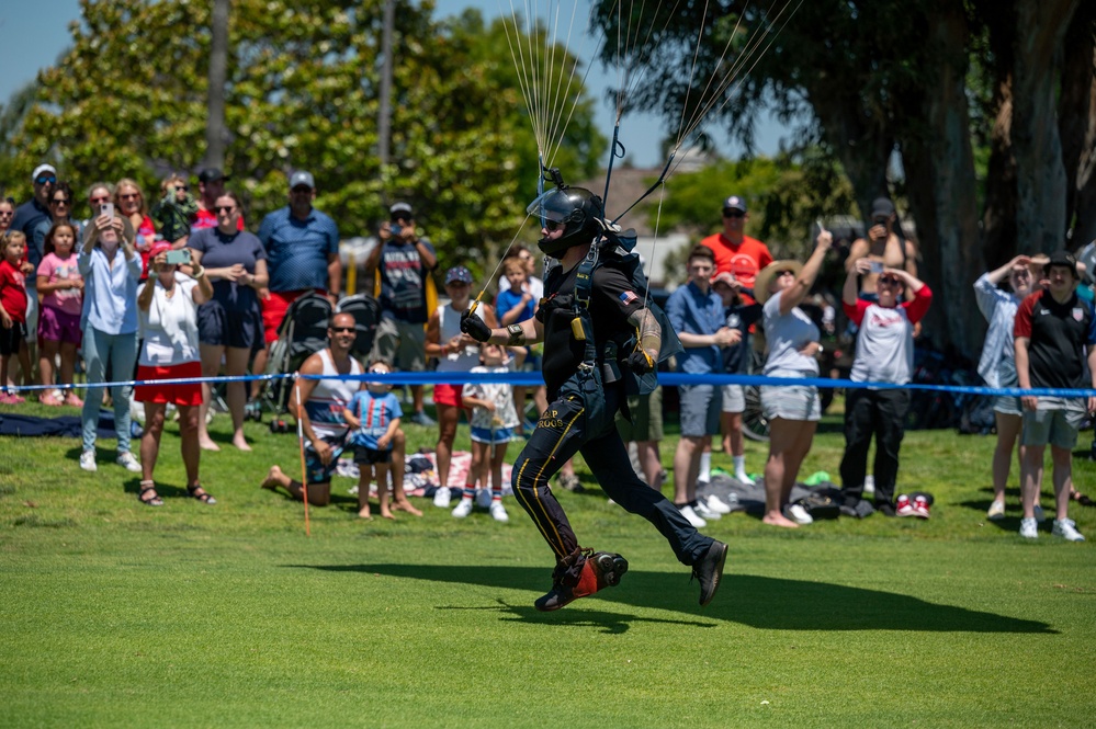 Navy parachute team, the &quot;Leap Frogs,&quot; jump into Coronado Island for 4th of July