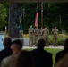 Command Sgt. Maj. Christopher Donaldson, the 2nd Brigade Combat Team command sergeant major, and Col. Scott Wence, the 2nd BCT commander, case the brigade colors on Fort Drum