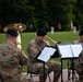 Command Sgt. Maj. Christopher Donaldson, the 2nd Brigade Combat Team command sergeant major, and Col. Scott Wence, the 2nd BCT commander, case the brigade colors on Fort Drum