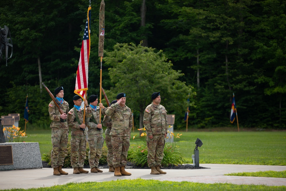 Command Sgt. Maj. Christopher Donaldson, the 2nd Brigade Combat Team command sergeant major, and Col. Scott Wence, the 2nd BCT commander, case the brigade colors on Fort Drum