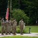 Command Sgt. Maj. Christopher Donaldson, the 2nd Brigade Combat Team command sergeant major, and Col. Scott Wence, the 2nd BCT commander, case the brigade colors on Fort Drum