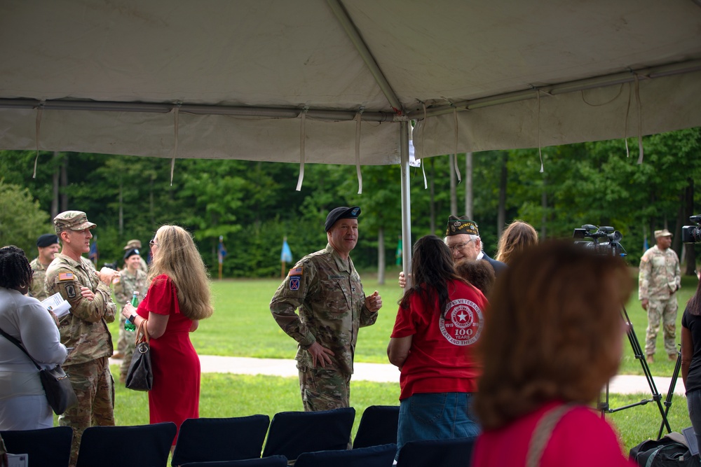 Col. Scott Wence, the 2nd BCT commander,  and Command Sgt. Maj. Christopher Donaldson, the 2nd Brigade Combat Team senior enlisted advisor, case the brigade colors on Fort Drum