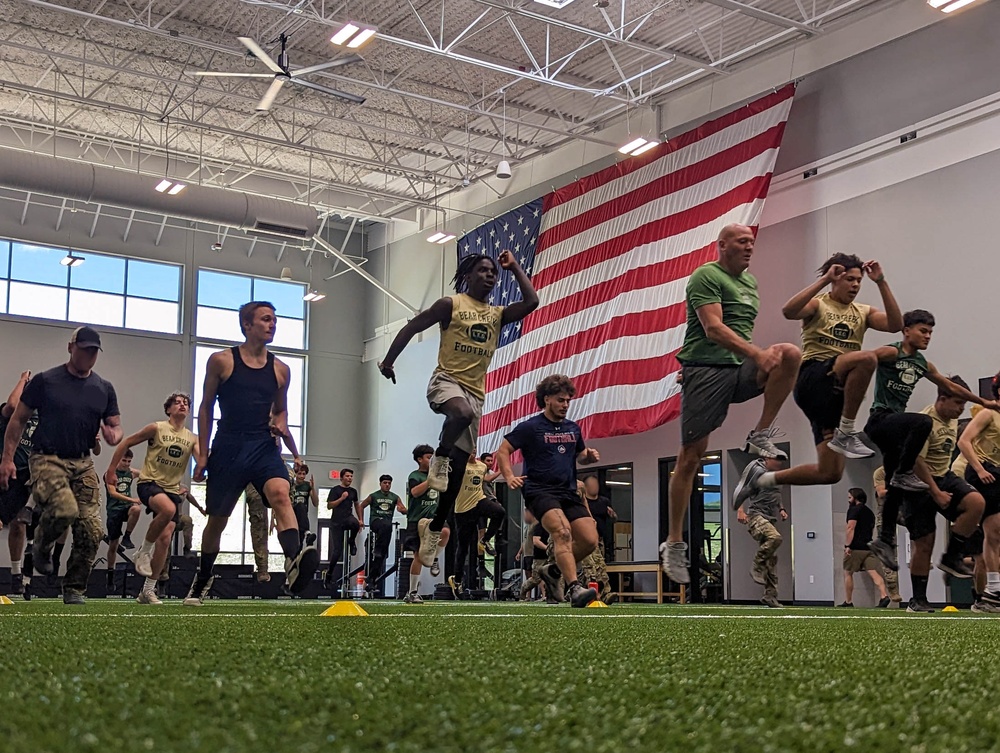 Bear Creek Highschool football team works out with 10th Special Forces Group