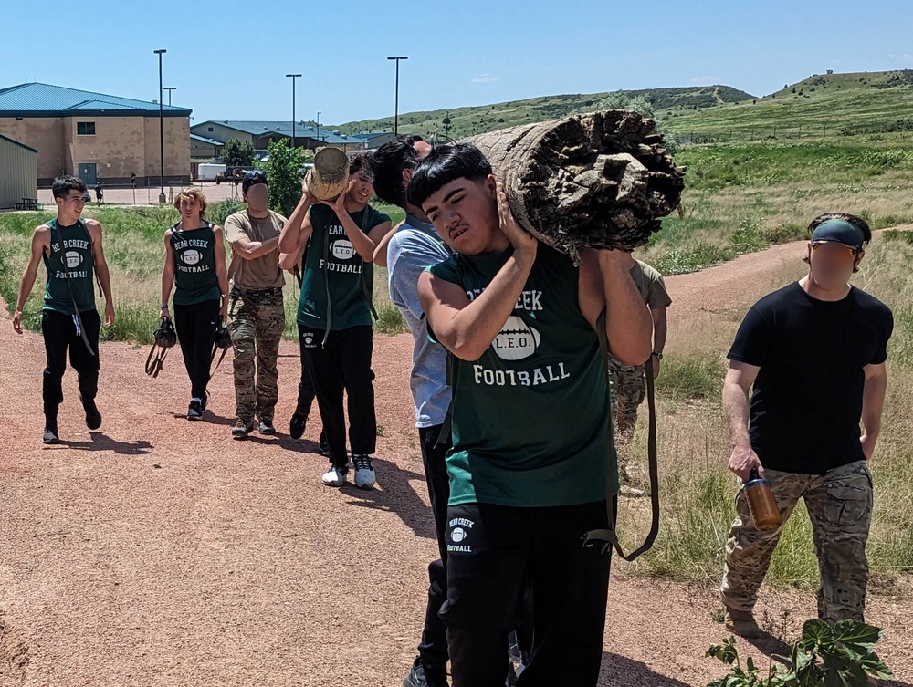 Bear Creek Highschool football team works out with 10th Special Forces Group