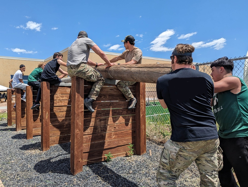 Bear Creek Highschool football team works out with 10th Special Forces Group