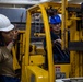 USS Ronald Reagan (CVN 76) Sailors change an engine