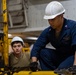 USS Ronald Reagan (CVN 76) Sailors change an engine