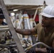 USS Ronald Reagan (CVN 76) Sailors change an engine
