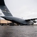 Yokota AB, Travis AFB Airmen load cargo onto C-17 Globemaster III in support of MG23