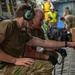 Yokota AB, Travis AFB Airmen load cargo onto C-17 Globemaster III in support of MG23