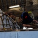 Yokota AB, Travis AFB Airmen load cargo onto C-17 Globemaster III in support of MG23