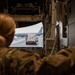 Yokota AB, Travis AFB Airmen load cargo onto C-17 Globemaster III in support of MG23