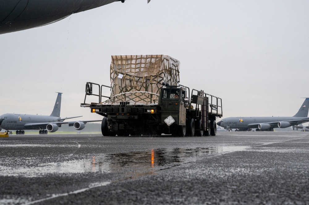 Yokota AB, Travis AFB Airmen load cargo onto C-17 Globemaster III in support of MG23