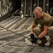 Yokota AB, Travis AFB Airmen load cargo onto C-17 Globemaster III in support of MG23