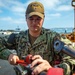 Sailor Performs Maintenance aboard USS Carl Vinson (CVN70)