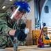 Sailor Bands Pallets in the Hangar Bay aboard USS Carl Vinson (CVN70)