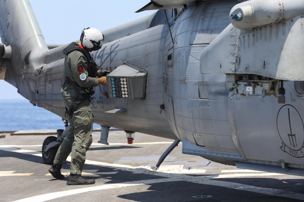 Pilot Checks His Helicopter