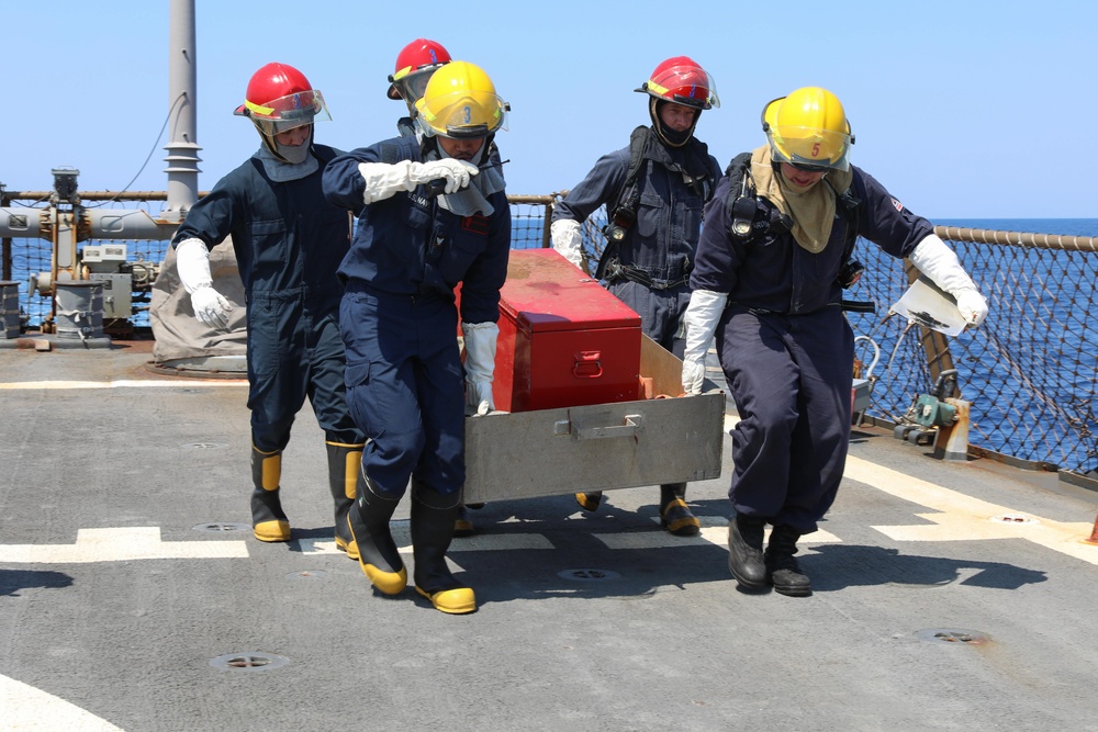Sailors Practice Moving Firefighting Equipment